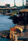 The Eastbank Esplanade provides visitors with a unique and distinctively urban experience. Tucked between Interstate 5 and the Willamette River, the Esplanade is 1.5 miles long, extending from the Hawthorne Bridge to the Steel Bridge with connections to eastside neighborhoods as well as across the river. Primarily a pedestrian/bicycle corridor, it offers unparalleled views of downtown Portland and leaves visitors with a whole new perspective of the river and the eastside.