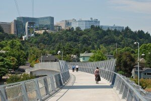 Looking west on the Gibbs Street Pedestrian Bridge, in Portland, Oregon, towards Marquam Hill and OHSU. Photo by Steve Morgan.